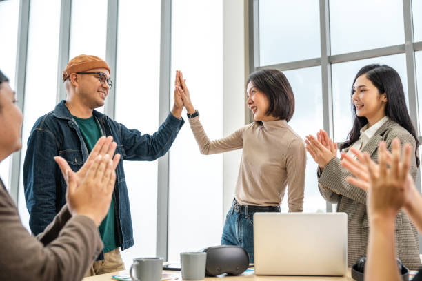 istock Asian business start up freelance people team analyzing statistics financial. Group Team of businesspeople man and woman Meeting Conference Discussion various topic Corporate Concept in office. 2163918719