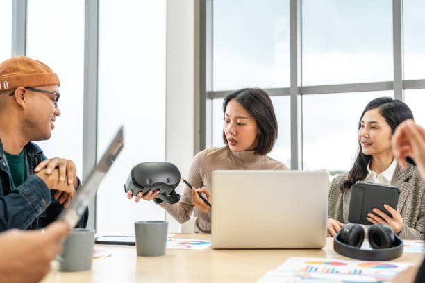 istock Asian business start up freelance people team analyzing statistics financial. Group Team of businesspeople man and woman Meeting Conference Discussion various topic Corporate Concept in office. 2163922485