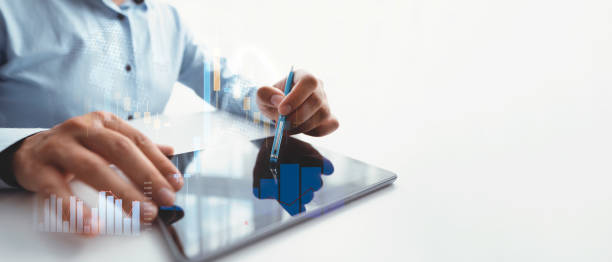 istock Businessman using tablet. Finance concept 2163926323