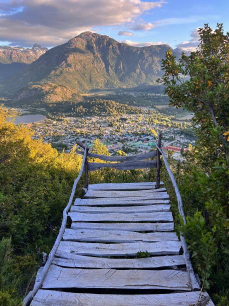 Wooden walkway and distant mountains Wooden walkway and distant mountains, Futaleufu, Carretera Austral, Patagonia carretera austral chile stock pictures, royalty-free photos & images