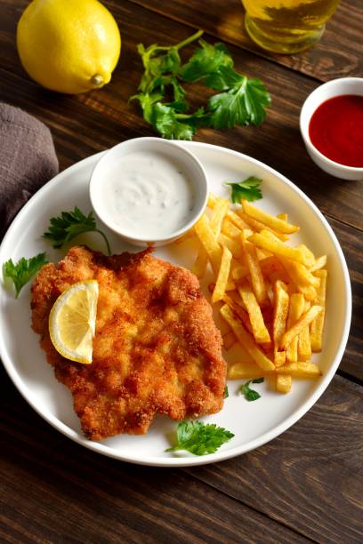 istock Weiner schnitzel with potato fries 2163931873
