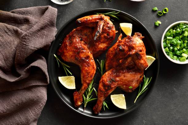 istock Grilled half chicken with lemon and rosemary 2163933089
