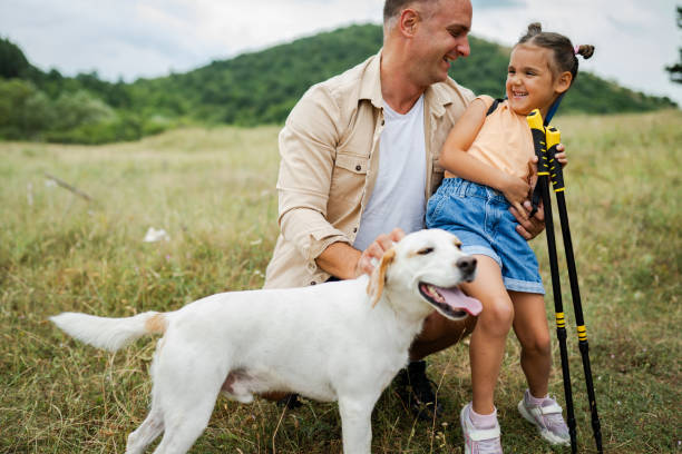 istock Dad and daughter hiking 2163937068