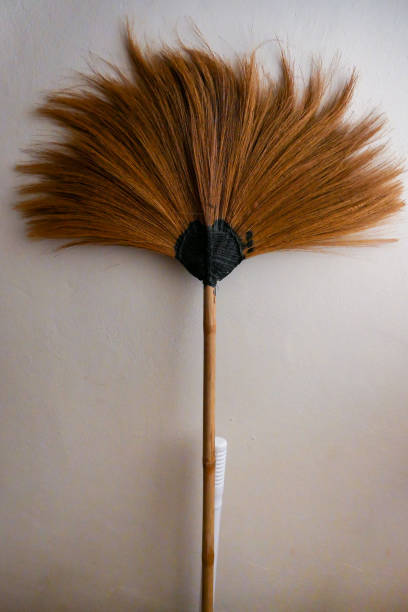 istock Antique grass broom in upside down position 2163941645