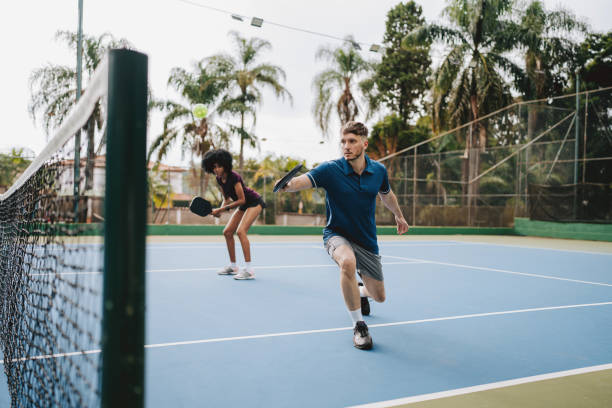 istock Two friends playing pickleball 2163942006