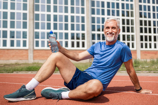 istock Confident mature athlete runner taking a break looking at camera 2163948455
