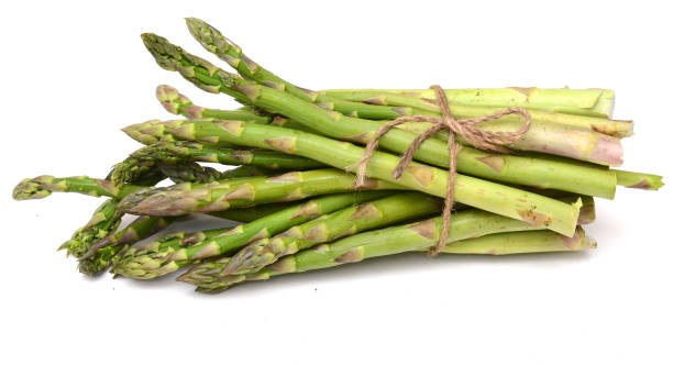 istock A fresh asparagus sprout bunch with tied rope on white 2163950046