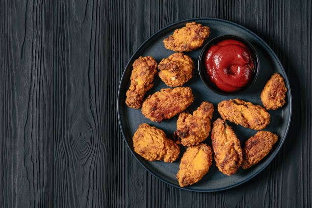 istock american style fried chicken wings on a plate 2163955992