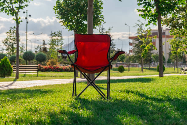 istock Red camping chair in the parking area 2163959224