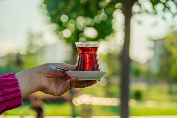 istock Traditional Turkish black tea in a slim tea glass 2163959263
