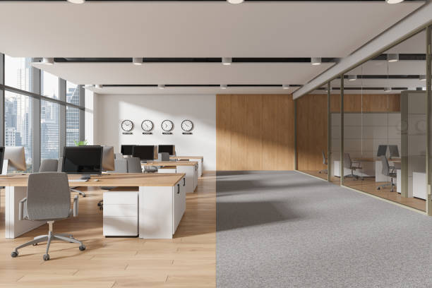 istock Office coworking interior with armchairs and pc on desks, panoramic window 2163970154