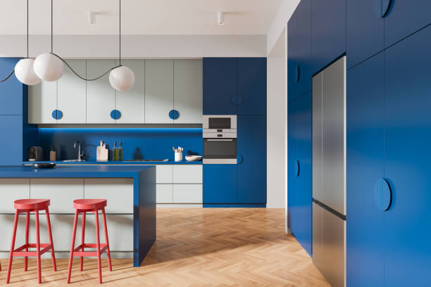 istock Colored blue home kitchen interior with bar island and cooking cabinet, fridge 2163970970