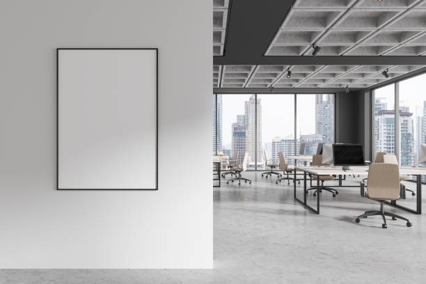 istock Modern office business room interior with workspace near window. Mockup frame 2163972057