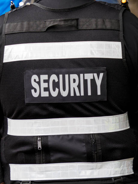 istock Rear View of Security Guard Vest 2163972915
