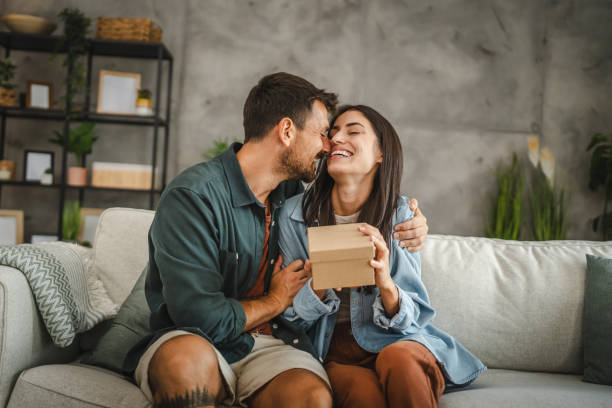 istock Boyfriend surprise his girlfriend for birthday with gift present 2163975336