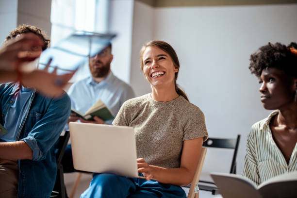 istock Group Of Diverse Colleagues Enjoying A Training Session 2163977148