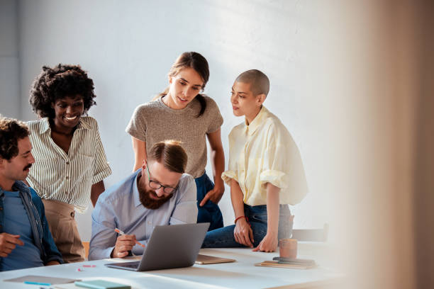 istock Diverse Team Collaborating on New Project in Modern Office 2163977160