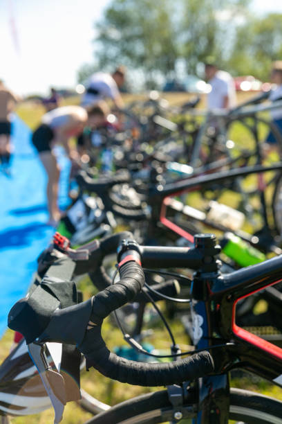 Bicycles in cycling or triathlon competitions. Sports bicycles in the parking area in the transfer area of the triathlon competition.