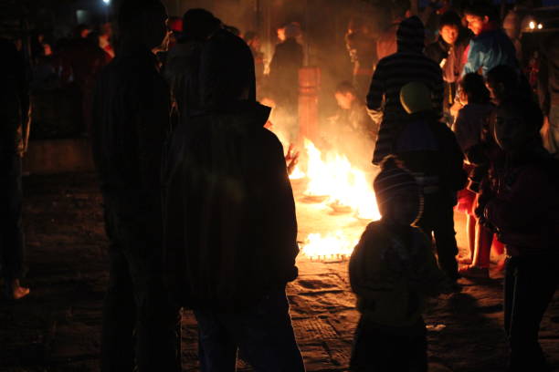 Manakamana Temple, Gorkha, Nepal - Taken November 23, 2012. The temple is just over 100 kilometers from the capital city of Kathmandu. Popular temple in the country where according to legend wishes come true. Locals and pilgrims here enjoying the warm fire in the night around the temple.