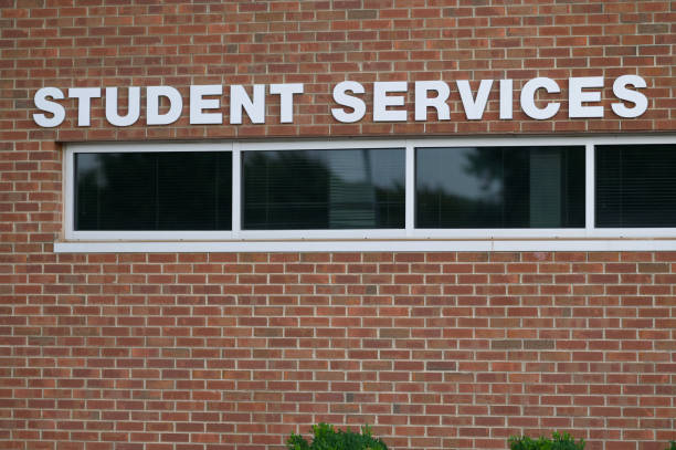istock Student Services sign on public university campus 2163980029