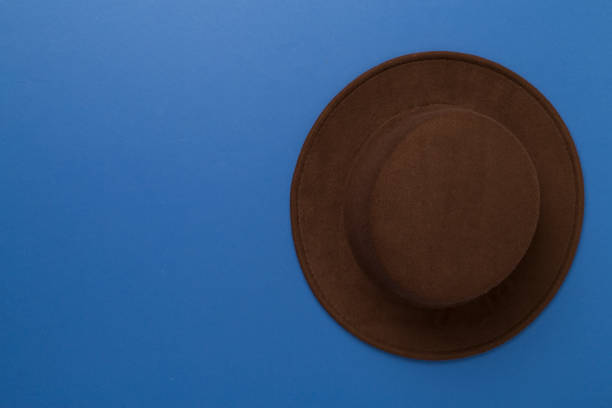 straw hat on green background. Straw hat concept. Vintage concept. space for text.