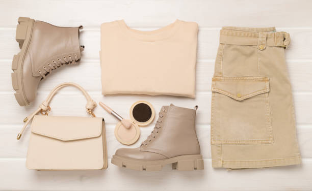 istock Flat lay with trendy spring outfit on wooden background, top view 2163980125