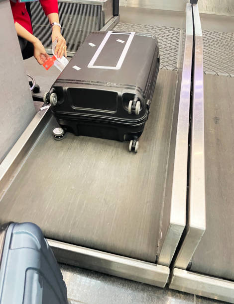 istock Check in a suitcase at  the airport. 2163984930