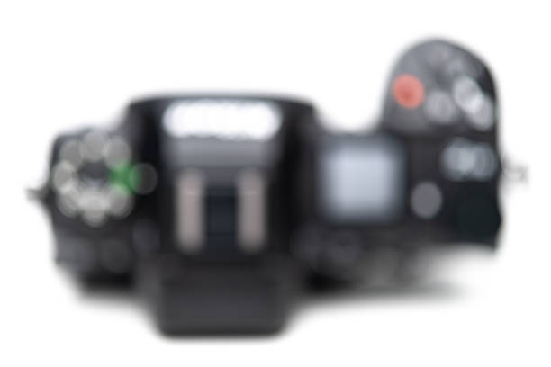 Black Digital Camera Lens and DSLR Camera Close Up On Dark Background