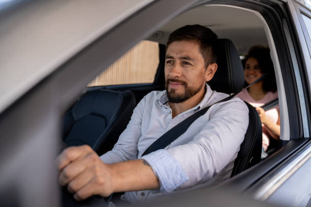 istock Crowdsourced taxi driver driving a passenger 2163991705