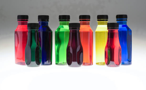 istock Bright coloured plastic bottles with colourful liquid showing colour changes has light passes through them 2163992905
