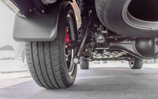 istock SUV car suspension and rear drive shaft. 2163994410