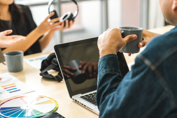 istock Asian business start up freelance people team analyzing statistics financial. Group Team of businesspeople man and woman Meeting Conference Discussion various topic Corporate Concept in office. 2163997597