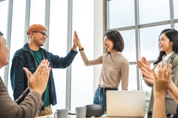 istock Asian business start up freelance people team analyzing statistics financial. Group Team of businesspeople man and woman Meeting Conference Discussion various topic Corporate Concept in office. 2163997622