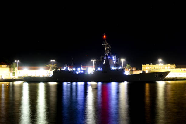 HMAS Hobart, DDG-39, a Hobart Class destroyer of the Royal Australian Navy docked at Garden Island naval base in Sydney Harbour. This image was achieved with a 30 second exposure and taken from Mrs Macquarie's Chair on a cold evening on 26 July 2024.