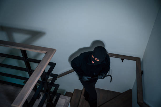 The thief breaks into the house through the balcony.