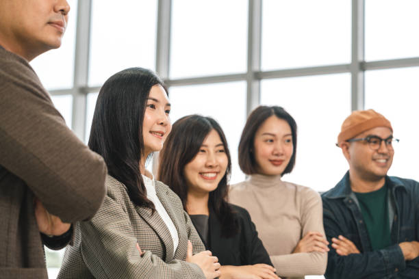 istock Asian business start up freelance people team analyzing statistics financial. Group Team of businesspeople man and woman Meeting Conference Discussion various topic Corporate Concept in office. 2163998512