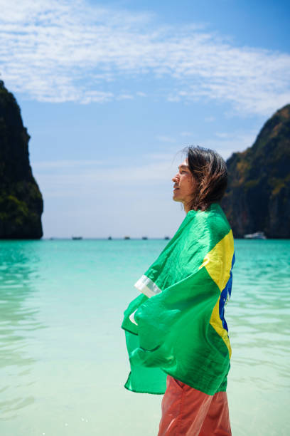 istock Man with Brazilian flag at Maya Bay - Phi Phi Island 2164007168