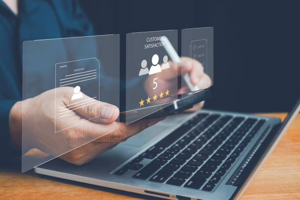 istock User gives rating to service experience on online application, Customer review satisfaction feedback survey concept, Customer can evaluate quality of service leading to reputation ranking of business. 2164007589