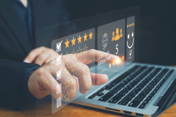 istock User gives rating to service experience on online application, Customer review satisfaction feedback survey concept, Customer can evaluate quality of service leading to reputation ranking of business. 2164007591