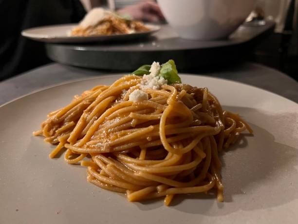 istock Spaghetti with tomato sauce, basil and parmesan 2164009052