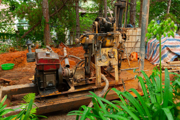 istock Ground water hole drilling machine working in a construction site for drilling piles 2164012530