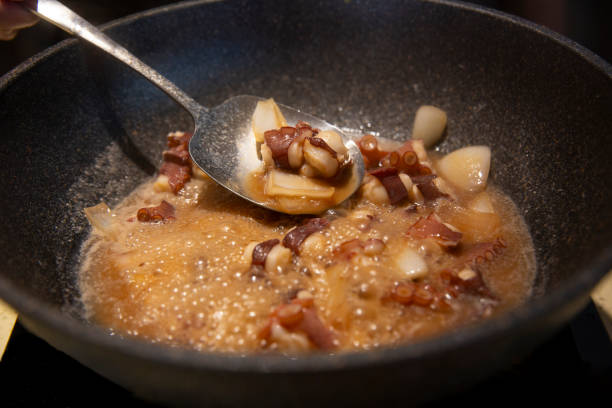 istock A person is cooking squid in the kitchen 2164013587
