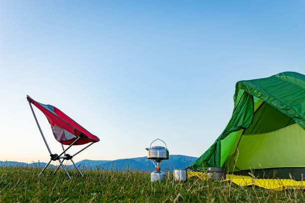 istock Camping high in the mountains with mountain views. 2164014070