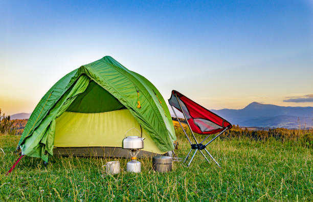 Equipment for camping and hiking in the mountains in summer.