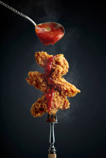 istock Fried chicken wings with tomato sauce. 2164015721