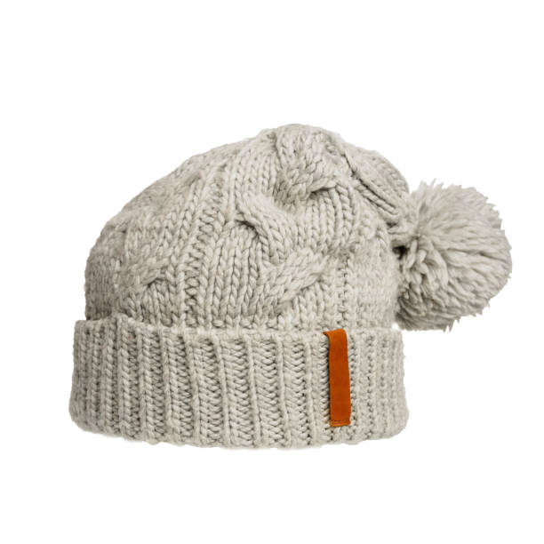 istock Gray knitted hat on a white background, a stylish and warm accessory for cold weather, suitable for any wardrobe 2164020441