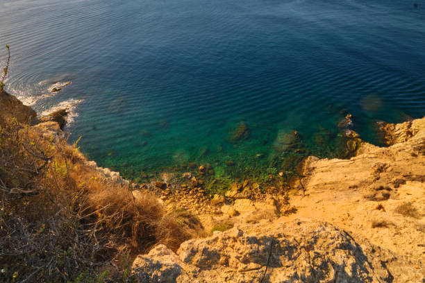 summer seascape rocky bay calm blue sea and clear sky