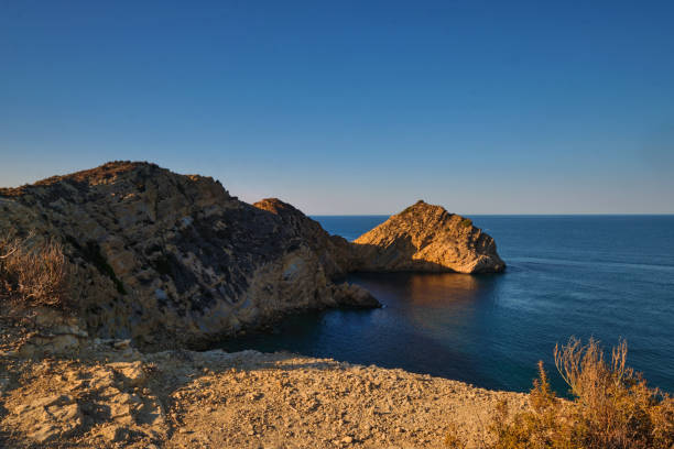 istock rocky bay calm blue sea 2164020545