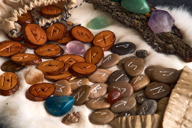 istock handmade wooden and stone runes 2164021744