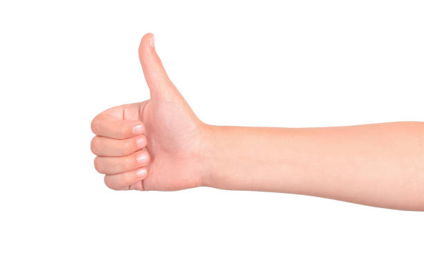 istock Kid's hand showing thumbs up 2164021877